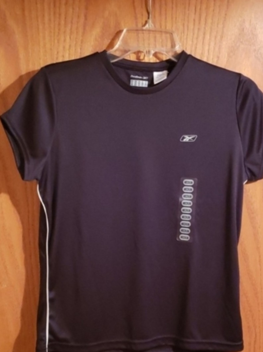 Reebok Wonen's Black Short Sleeve Athletic Tee with White Piping